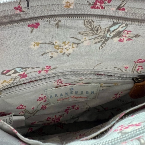 Brakeburn robin’s egg blue/gray cross body with a bird and a pink floral motif. - Picture 5 of 6